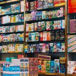 Bright and colorful display of various Asian products on supermarket shelves.
